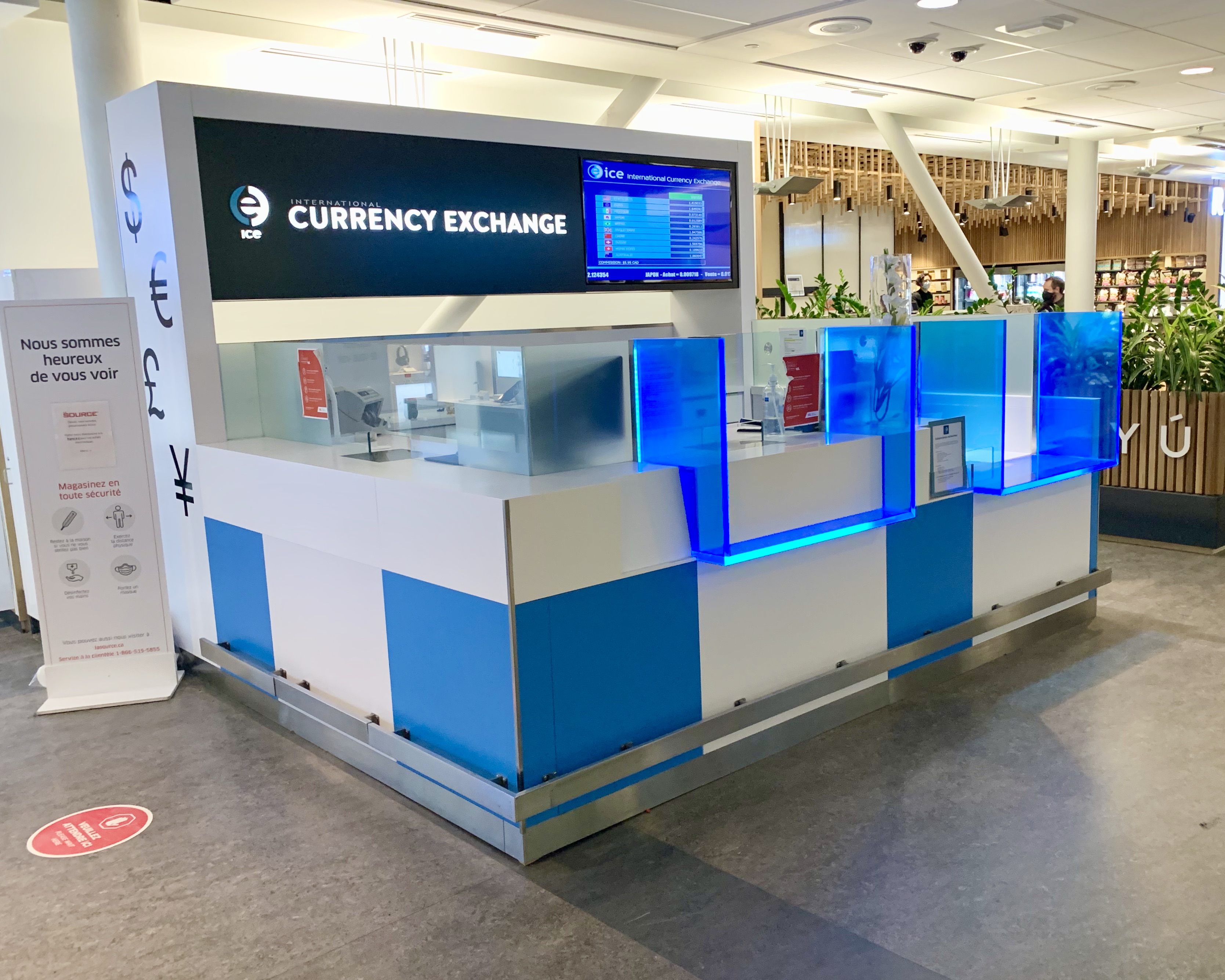 ICE Currency Exchange after security at Montréal–Trudeau International Airport YUL international departures Gate 49