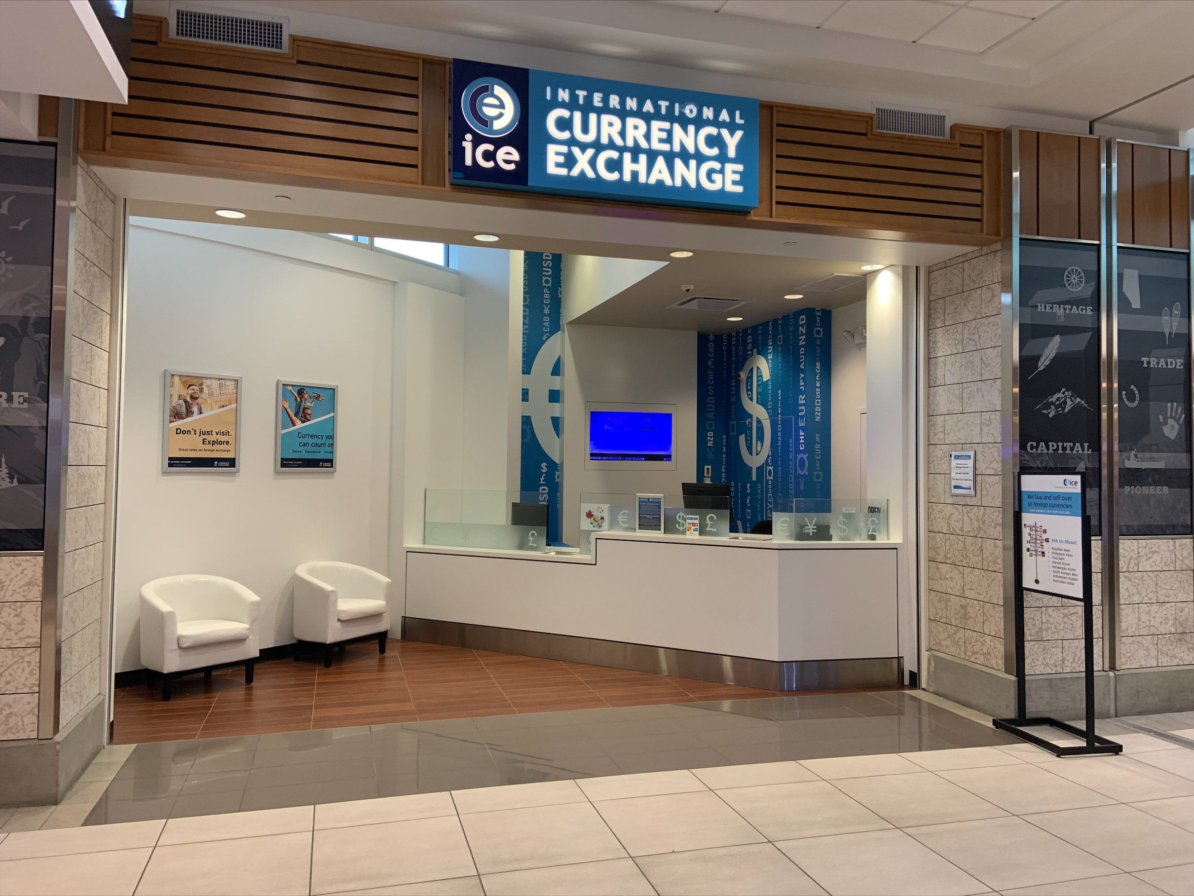 ICE Currency Exchange post-security in the US departures area beside the duty-free store at Edmonton International Airport YEG