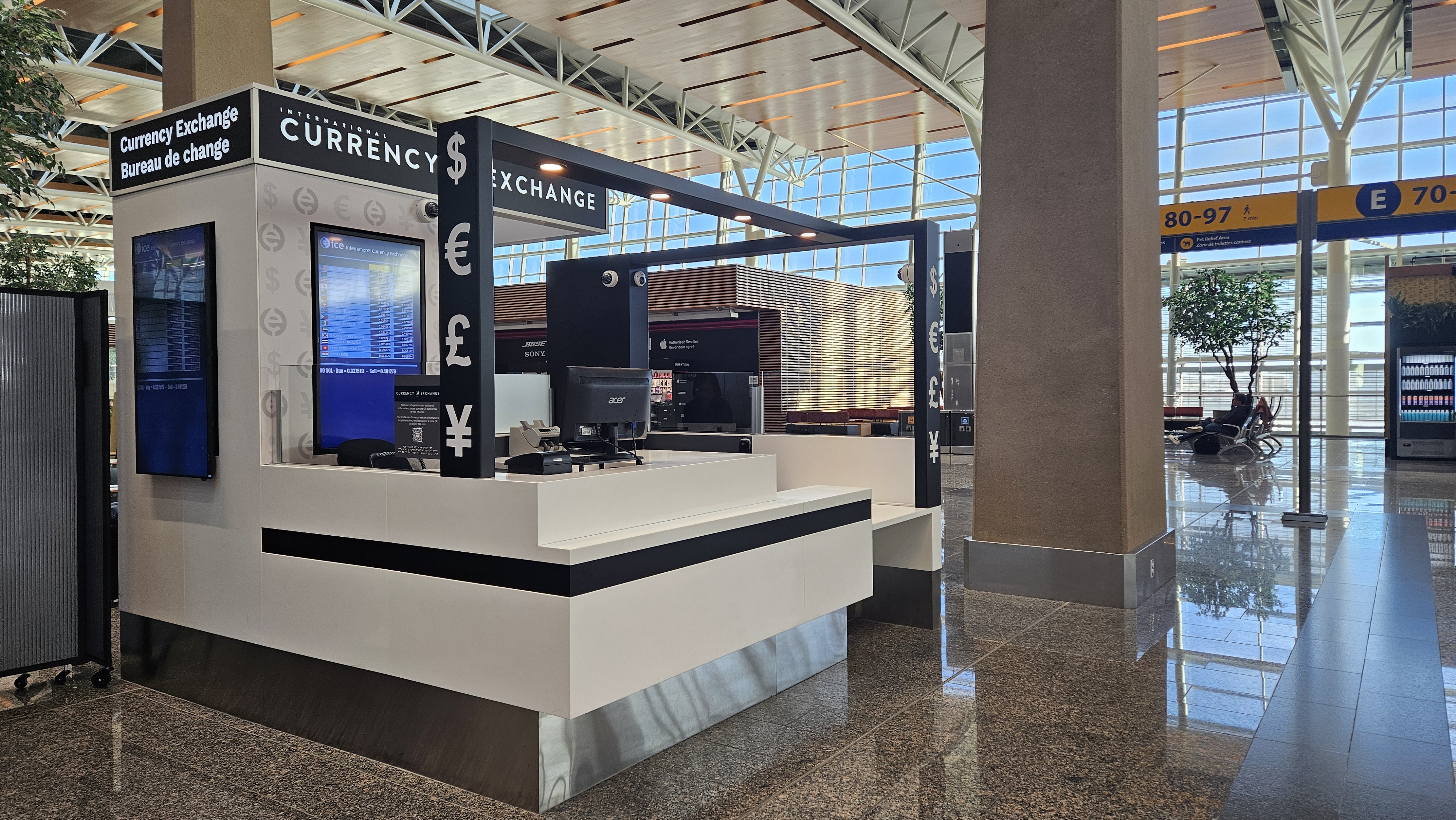 ICE International Currency Exchange kiosk at Calgary International Airport YYC US Transborder Concourse E